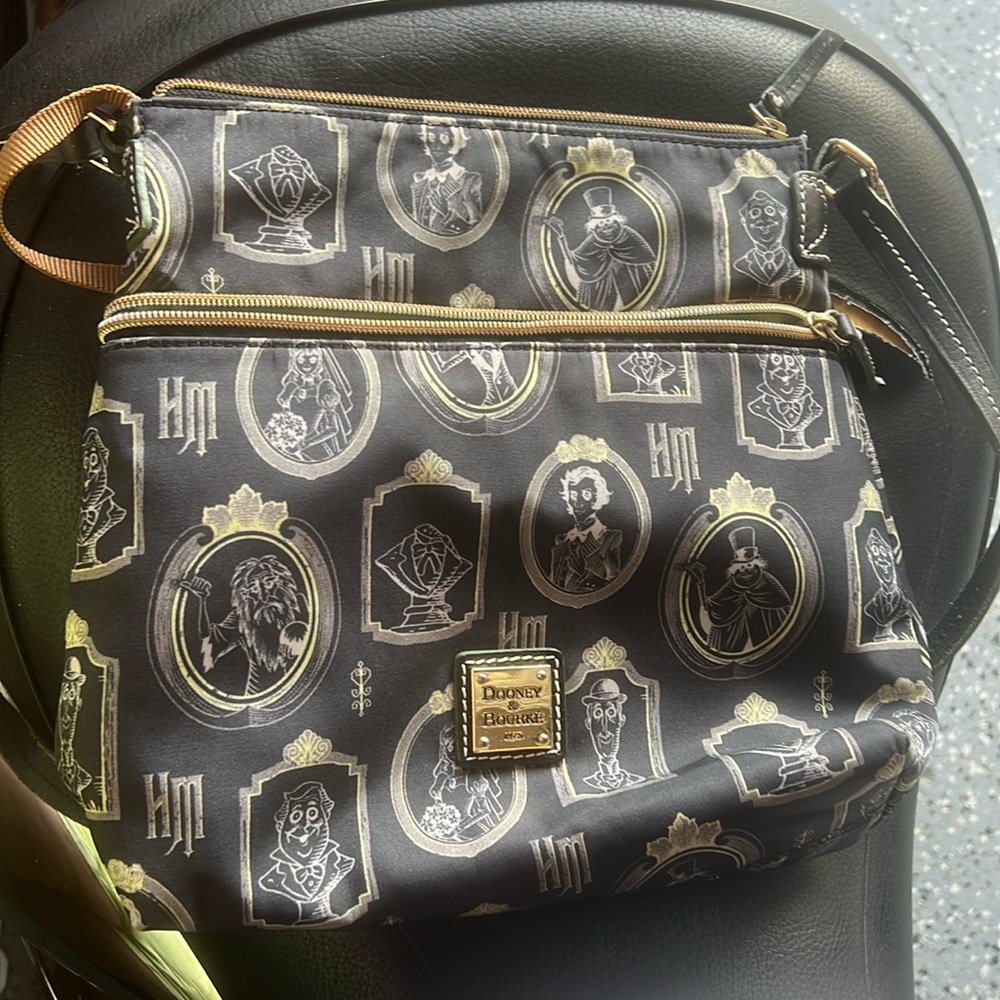 Disney, Dooney and Bourke haunted mansion, ghost heads.